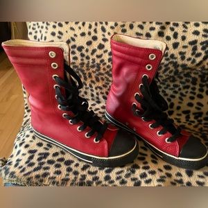 Colin Stewart red hi-top leather sneaker.